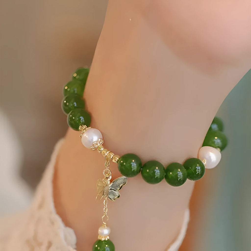 Natural green chalcedony gemstone bracelet with round beads in a minority design style for women.