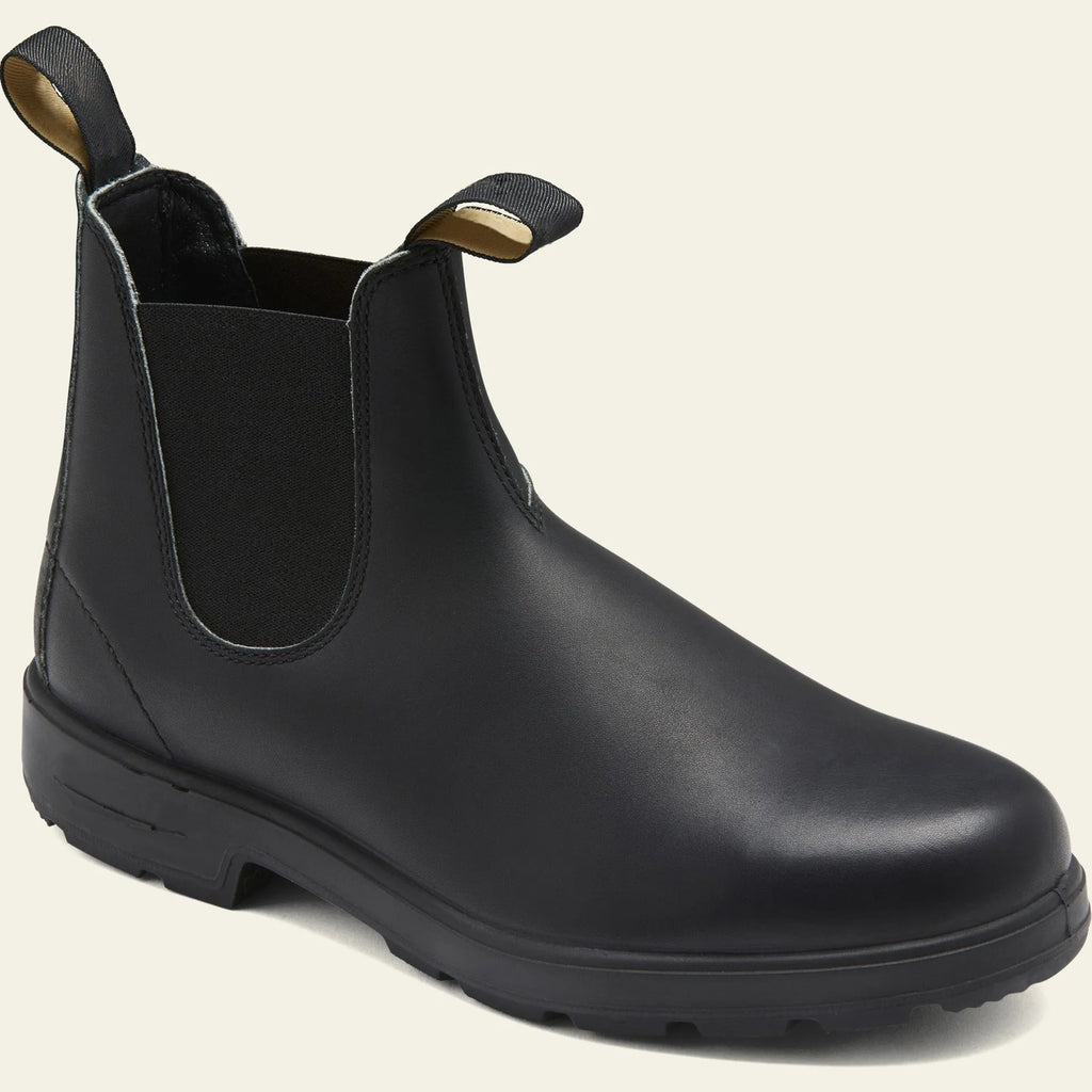 A pair of vintage-style brown unisex Chelsea boots with a round toe and low horseshoe heel.