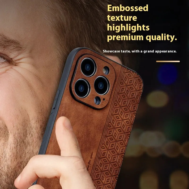 Imitation leather phone case with embossed pattern in blue for Apple iPhone, showing textured surface and cutouts