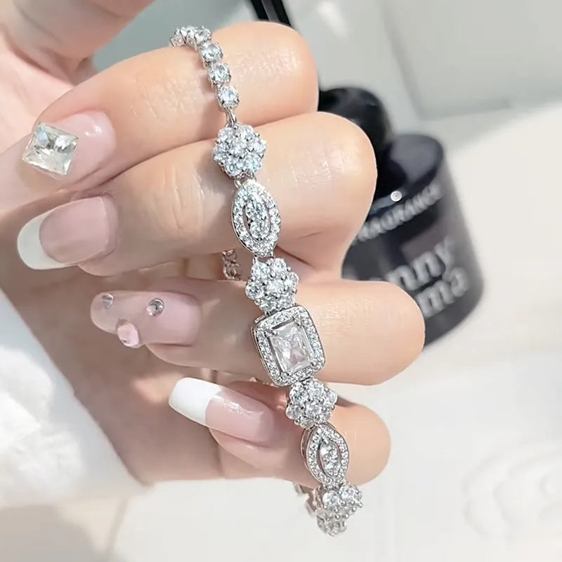 Women's silver-plated bracelet with sparkling zircon stones in a geometry shape.