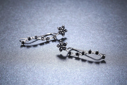 Women's Long Fringed Zircon Earrings in black with flower detailing