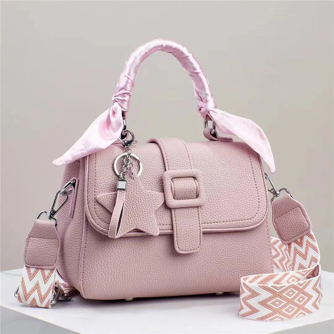 Solid colour handbag in beige with crocodile pattern texture, featuring a zippered top and interior organisation pockets