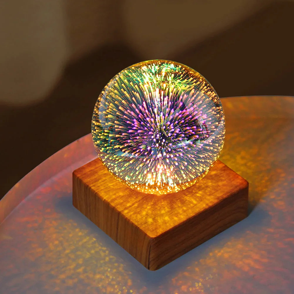 Spherical USB touch control LED night light showing starry sky pattern on a desk.
