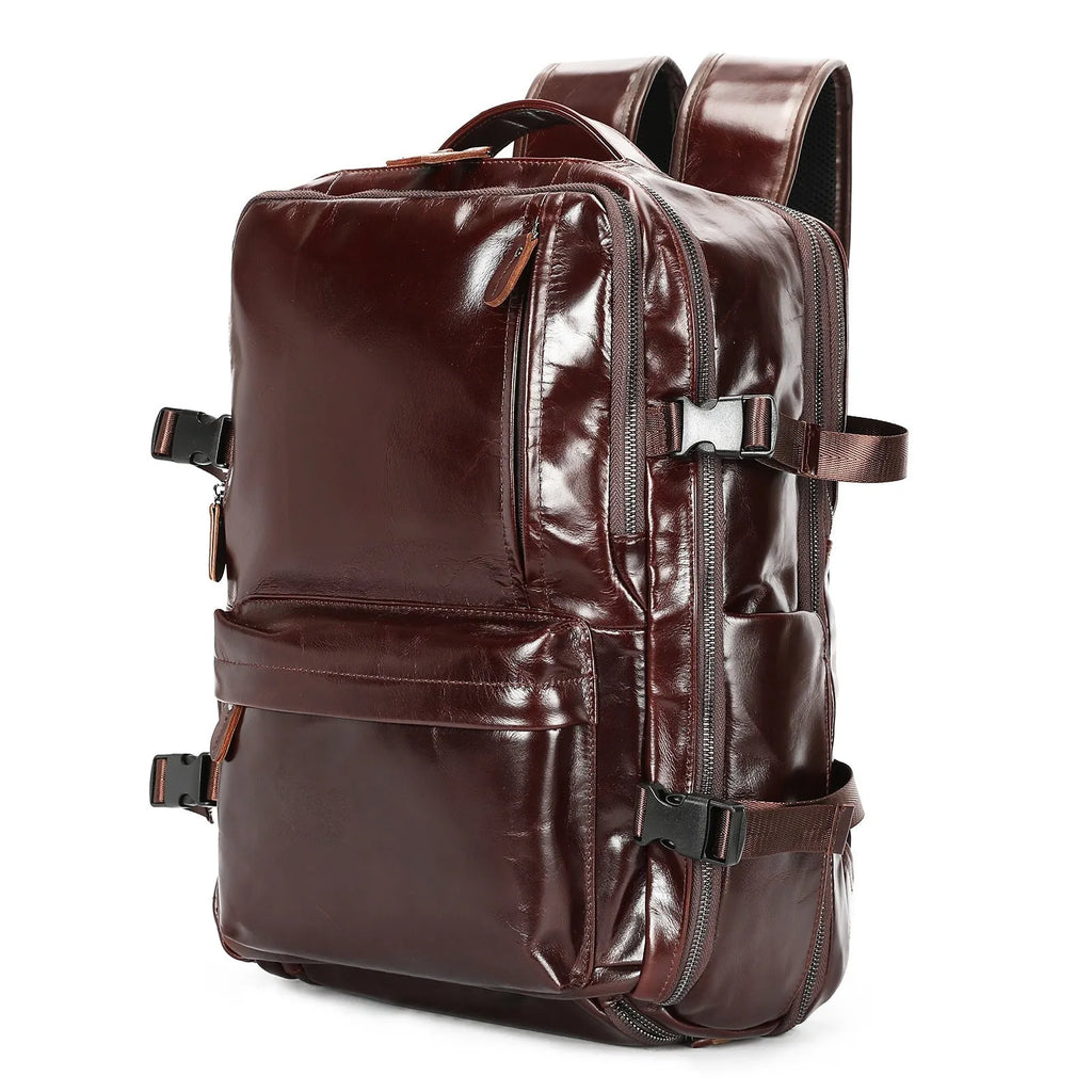 Large capacity genuine leather backpack in black, 30x20x45cm, with curved shoulder strap and retro design