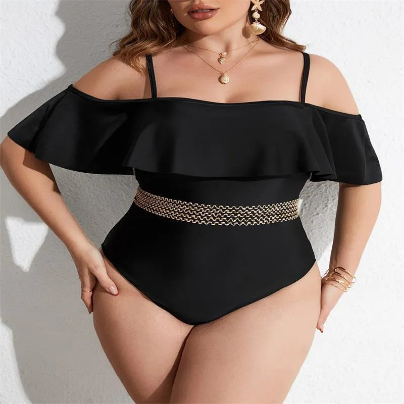 Black women's one-piece swimsuit on hanger, plus size range 0XL to 4XL.
