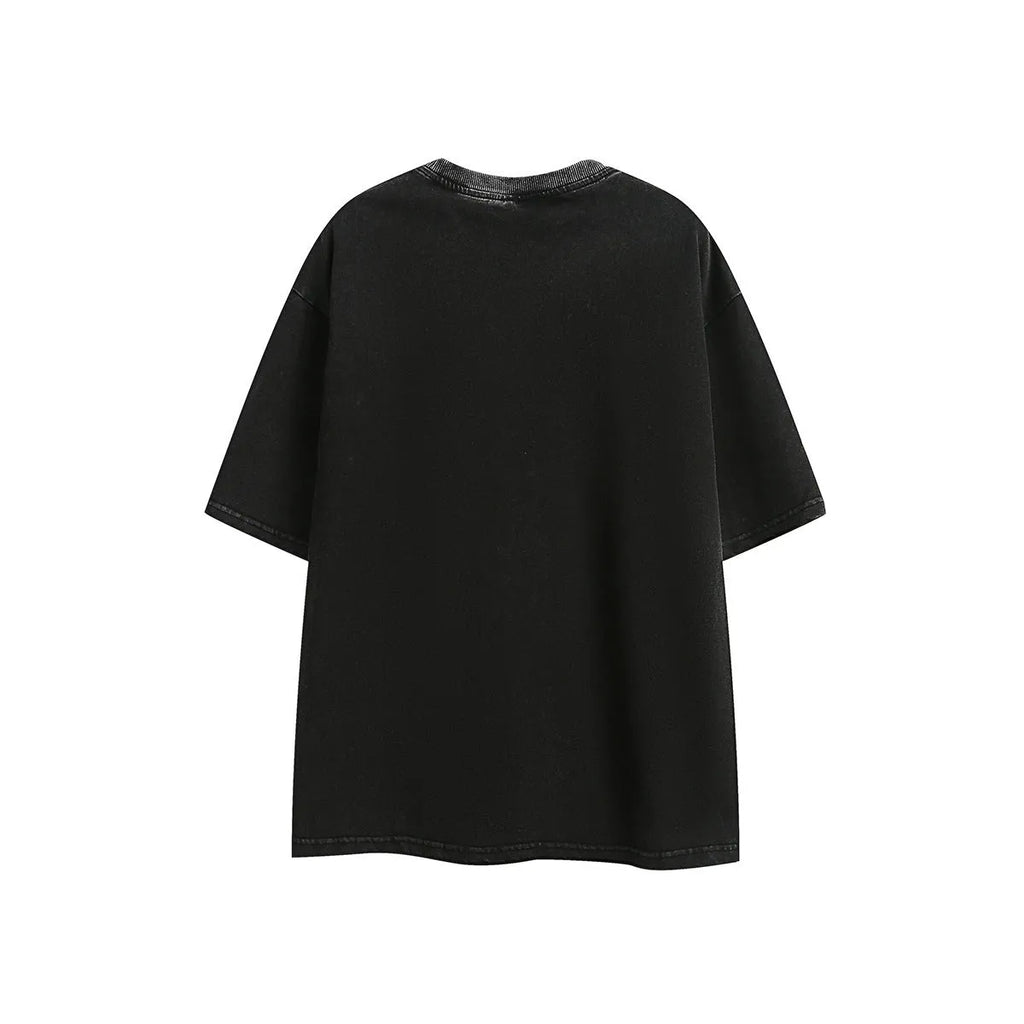 Loose fit purple short-sleeved cotton T-shirt with retro embroidery on a hanger.