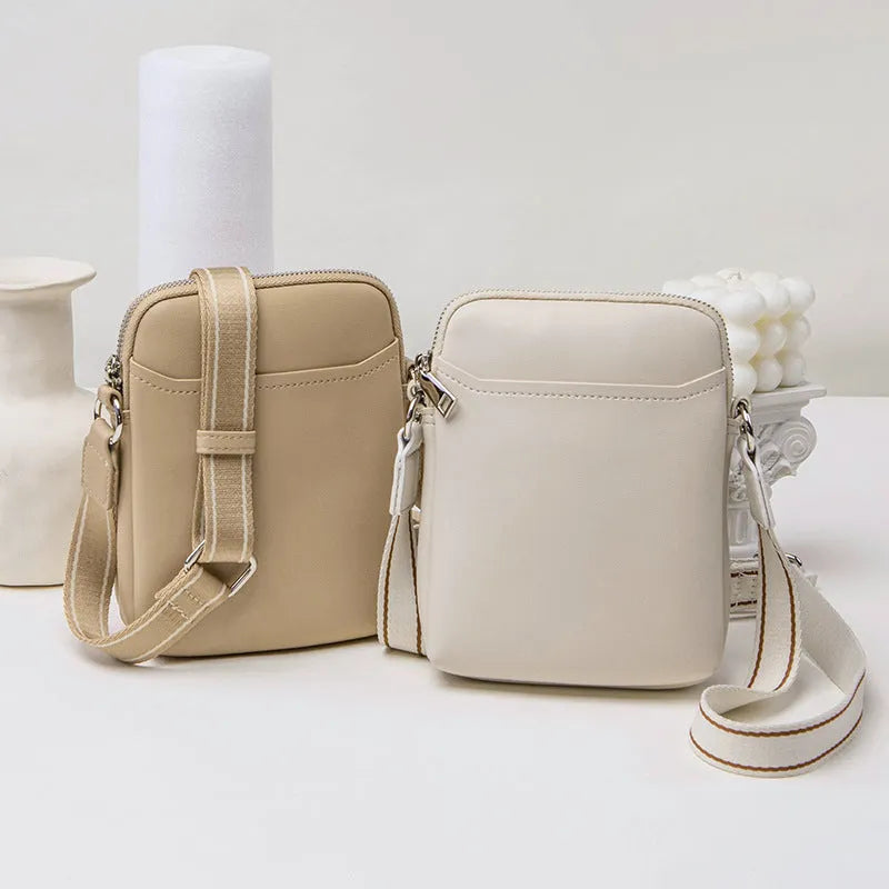 Solid colour PU leather crossbody phone bag in beige, shown with strap.