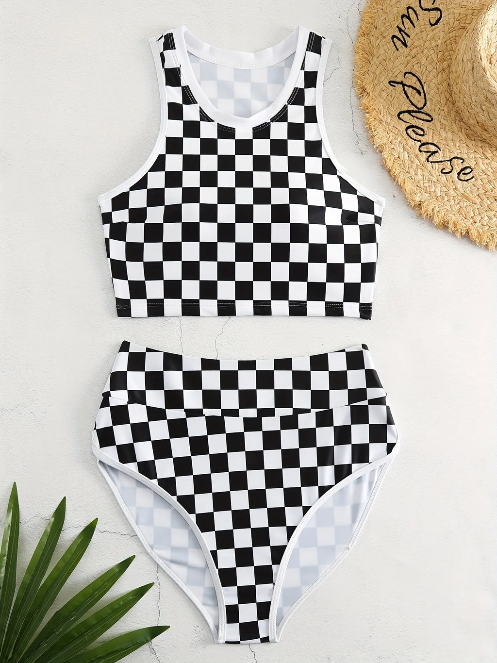 Women's black and white chessboard plaid racing one-piece swimsuit with a suspender backless design.