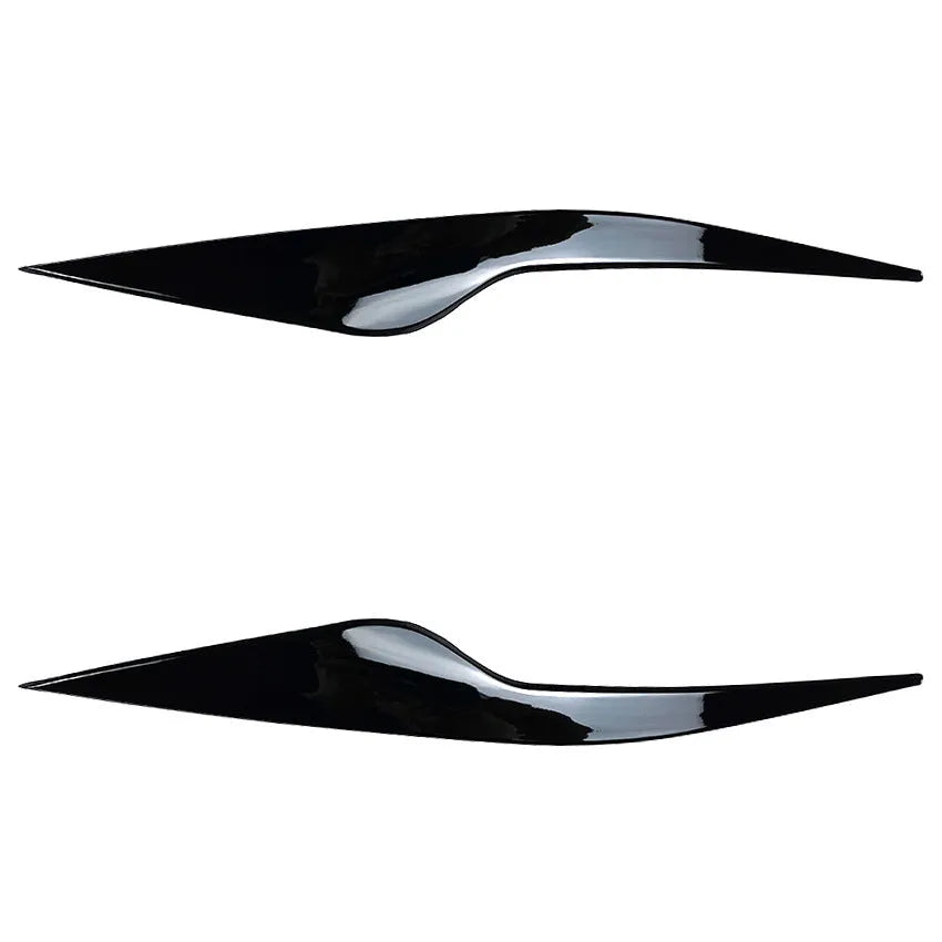 Pair of ABS plastic headlight eyebrow stickers for Ford Focus in carbon fibre pattern finish