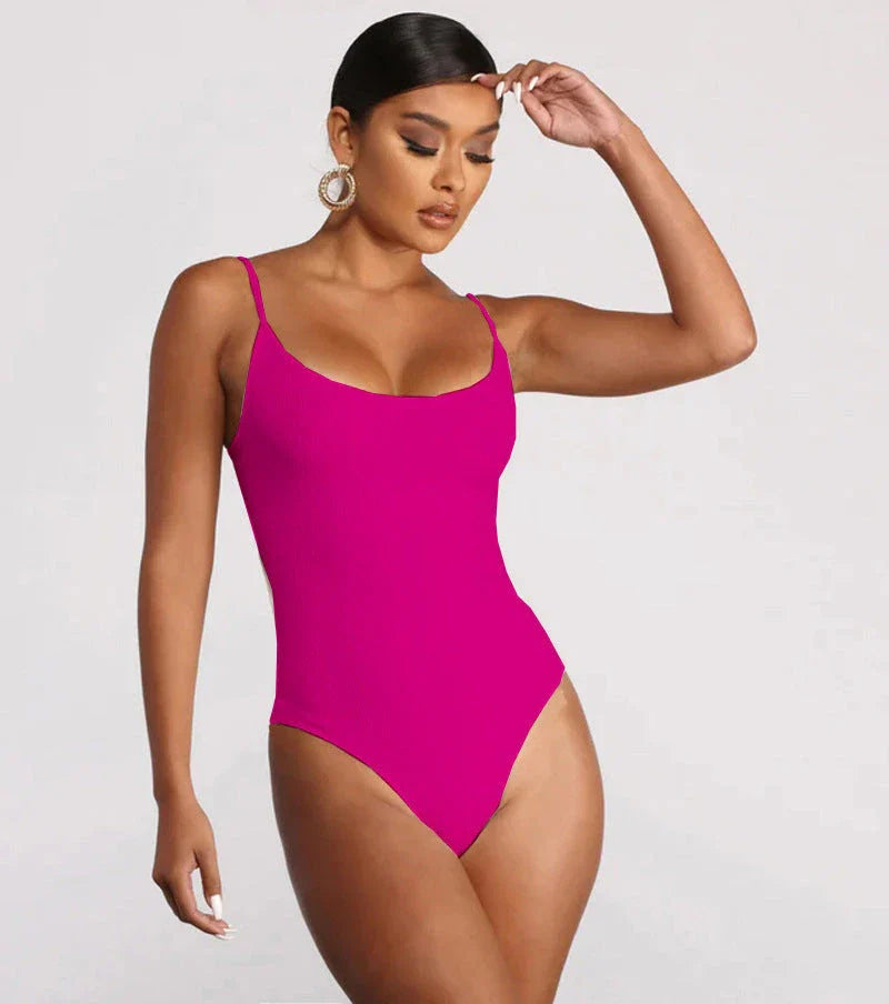 Stylish backless one-piece swimsuit for women in various vibrant solid colors