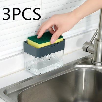 Dark blue 2-in-1 soap dispenser and sponge caddy unit on kitchen counter with measuring tape showing 13.5cm diameter