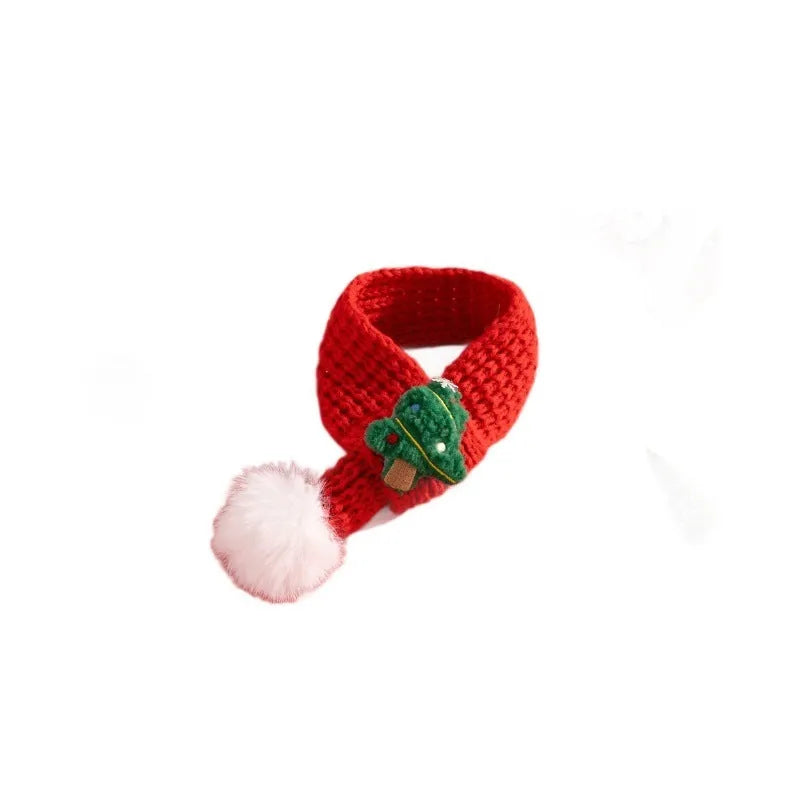 Christmas cat scarf with striped cartoon pattern in festive colours on a light background
