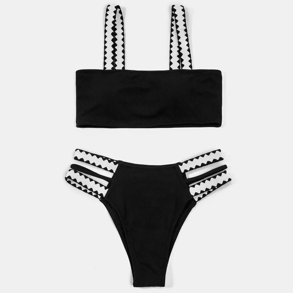 Black women's hollowed-out split swimsuit bikini set with cut-out design detail