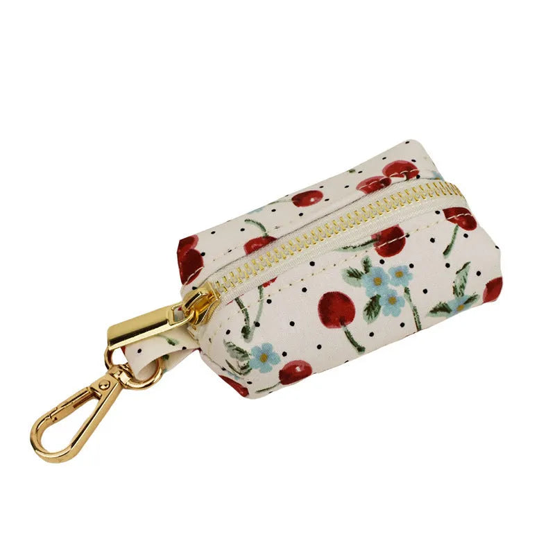 Red cherry printed dog collar and leash set with bow accessory and light gold release buckle