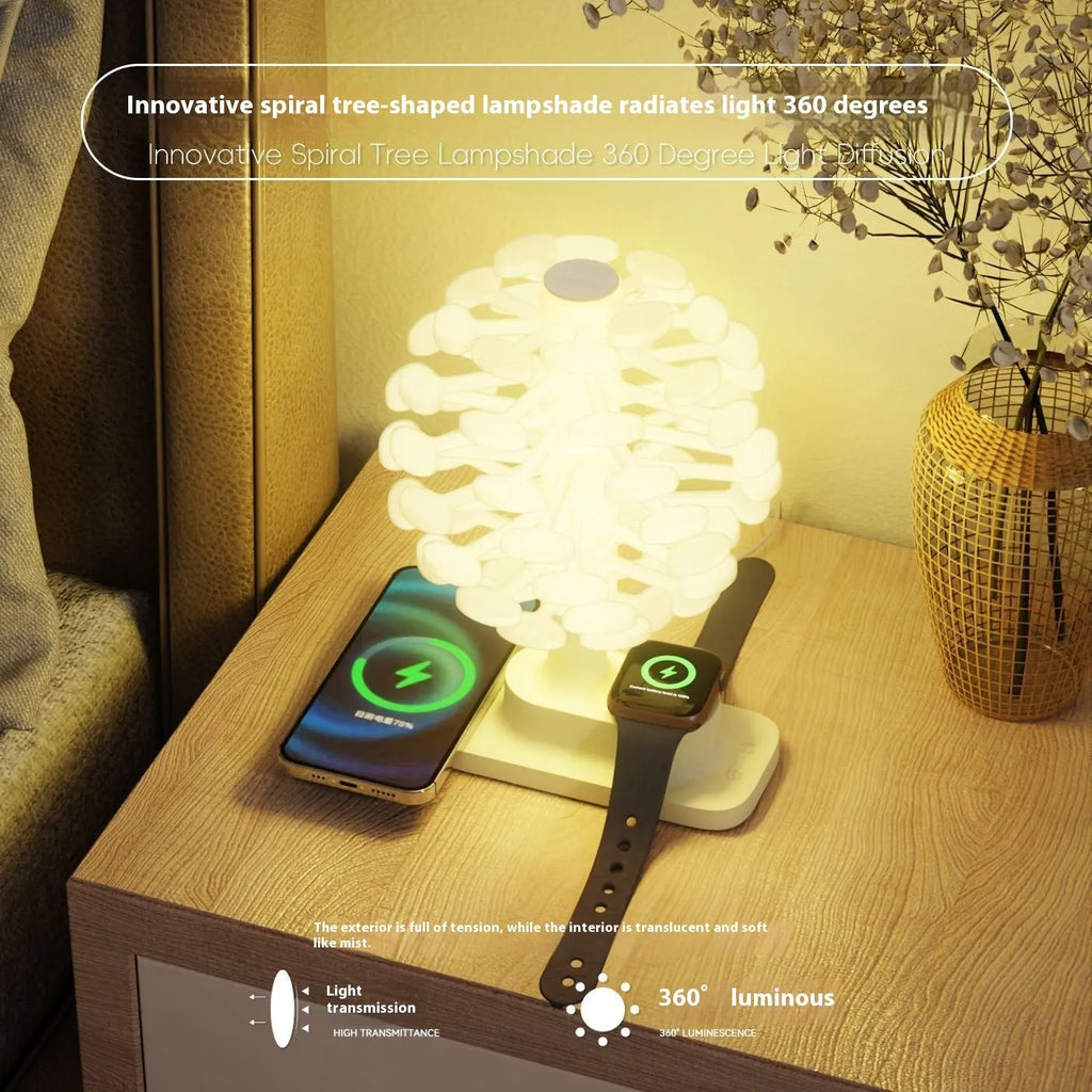 Spiral Tree geometric modern LED desk lamp with white light on a wooden surface.