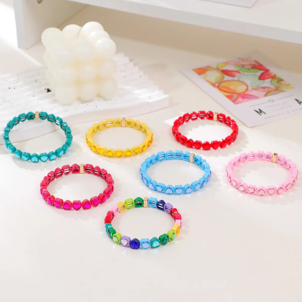 Rainbow enamel alloy heart stretch bracelet showing colourful pattern and heart charm