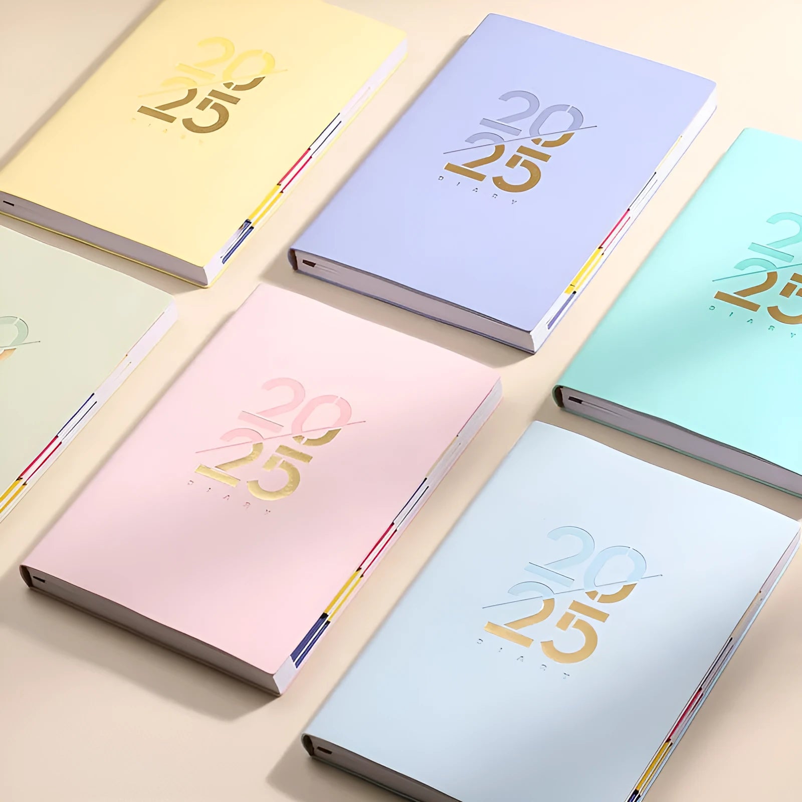 A5 2025 daily planner with soft faux leather cover in blue, green, pink, purple, or yellow.