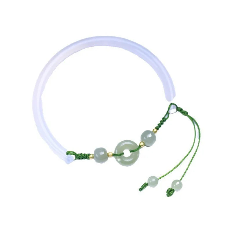 Hand-woven half bracelet with white agate and hetian jade beads and a peace buckle.