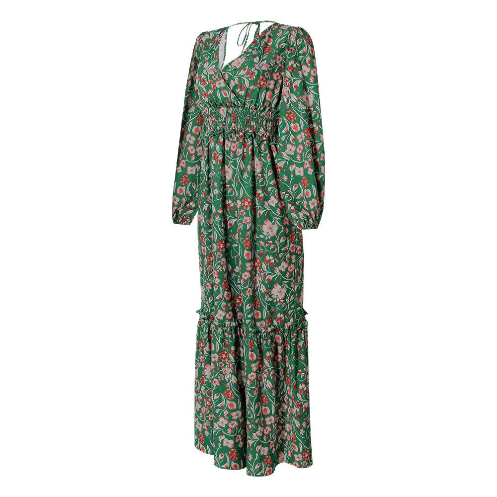 A stylish printed halter dress with a flattering V-neck, flowing long sleeves, and a beautifully draped swing skirt.