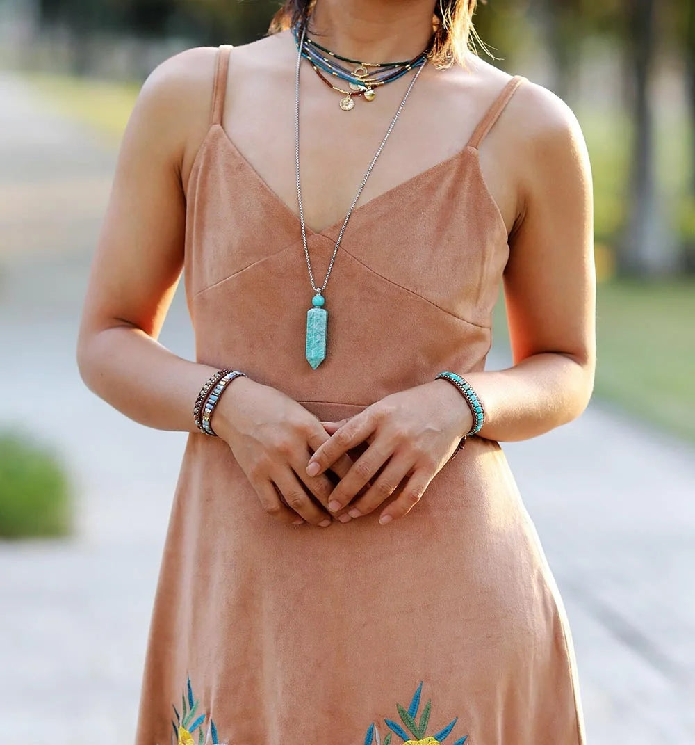 Hand-woven leather bracelet with blue imperial stone accent, geometric design