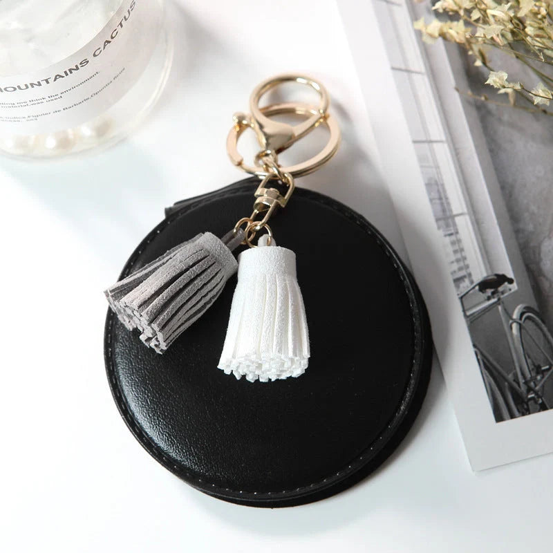 Mini round PU leather small mirror with tassel in various colours