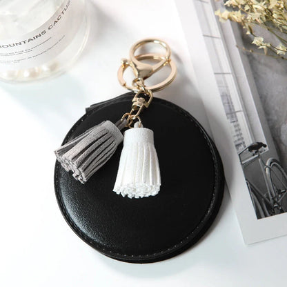 Mini round PU leather small mirror with tassel in various colours