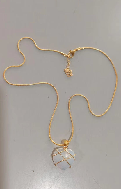 Heart-shaped moonstone pendant necklace with gold plating and adjustable chain
