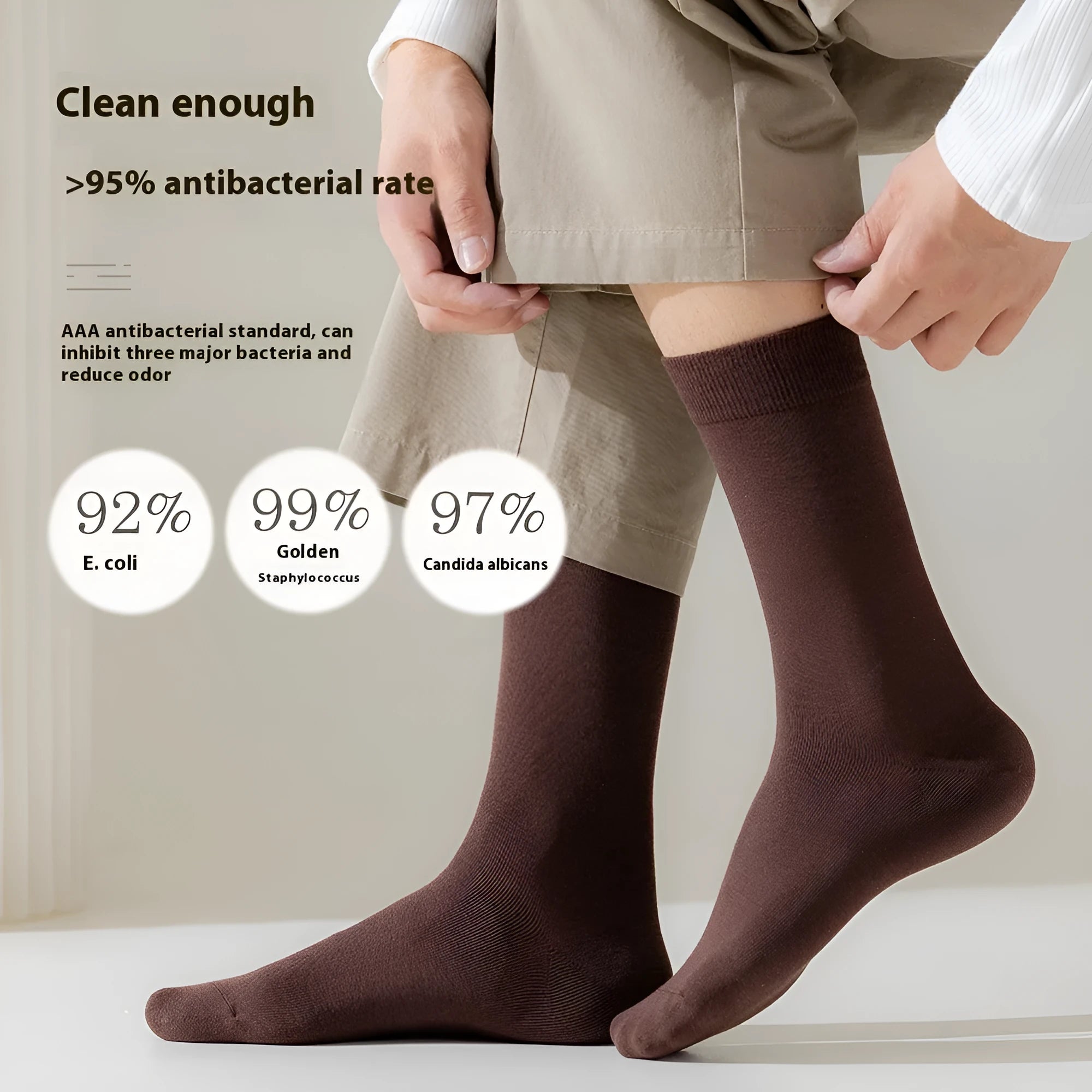 Men's mid-calf business socks in pure combed cotton showing solid colour options including army green, beige, black, and grey