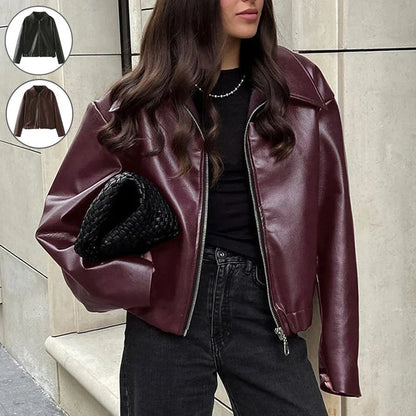 Stylish women's leather jacket with zipper detail in burgundy and black