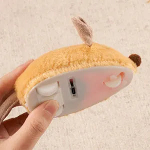 Grey and yellow rechargeable LED automatic moving cat mouse toy with feather and bell tail on floor