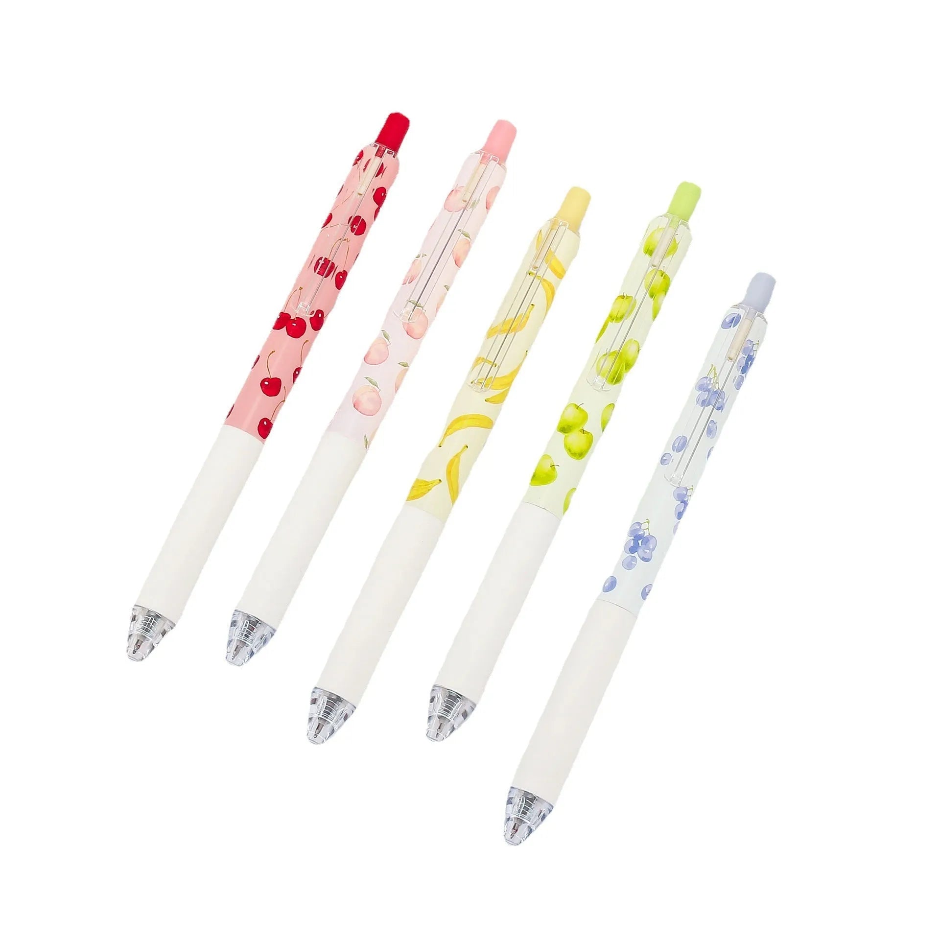 Three scented fruit ballpoint pens with press-action mechanism showing extended writing tips