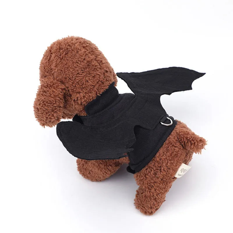 Black polyester bat wings costume accessory for a dog on chest and back.