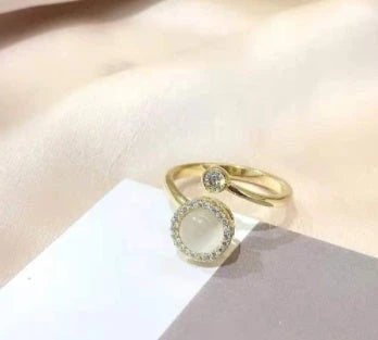 Adjustable rotating spinner ring with elegant flower and bee design in various color options