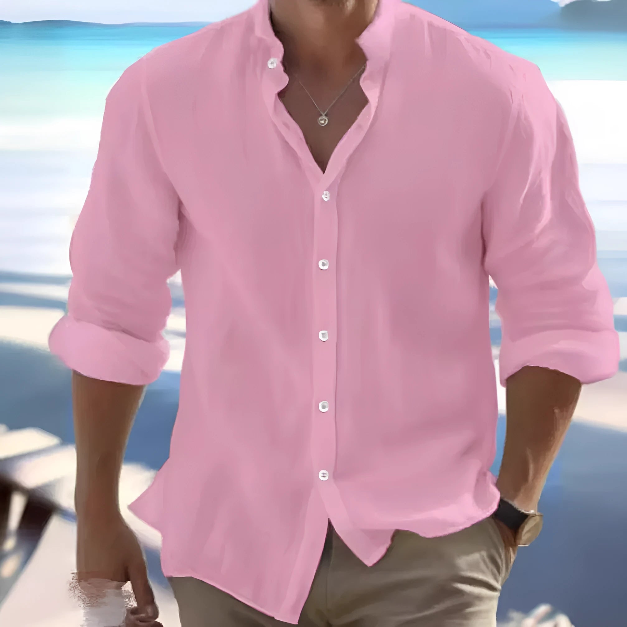 Man wearing a light blue long-staple cotton pullover summer shirt with casual collage stitching details.