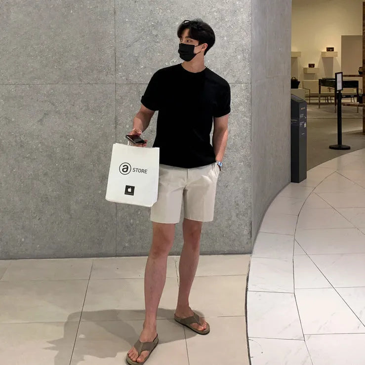 Men's straight-leg casual shorts in solid colour with loose fit for summer wear
