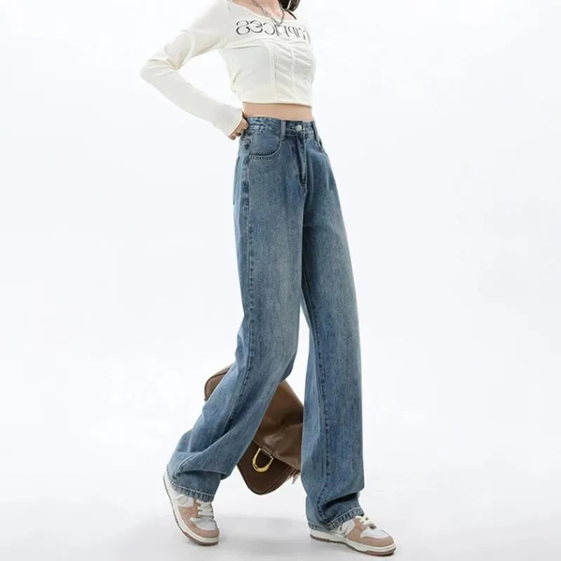 Woman wearing retro blue high waist wide leg jeans with a straight cut