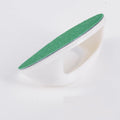 Square dog nail file board with ergonomic handle in one of four colours: black, blue, green, or yellow.