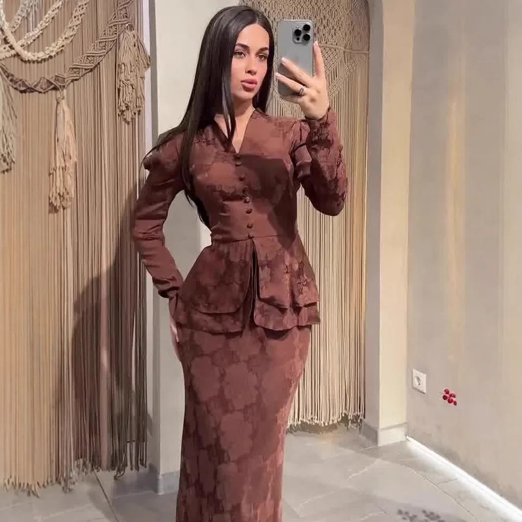 Dark brown long sleeve women's dress with floral pattern and button details on a fake two-piece design.
