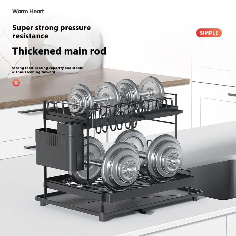 White double-layer metal kitchen draining rack with a removable top tray on a countertop.