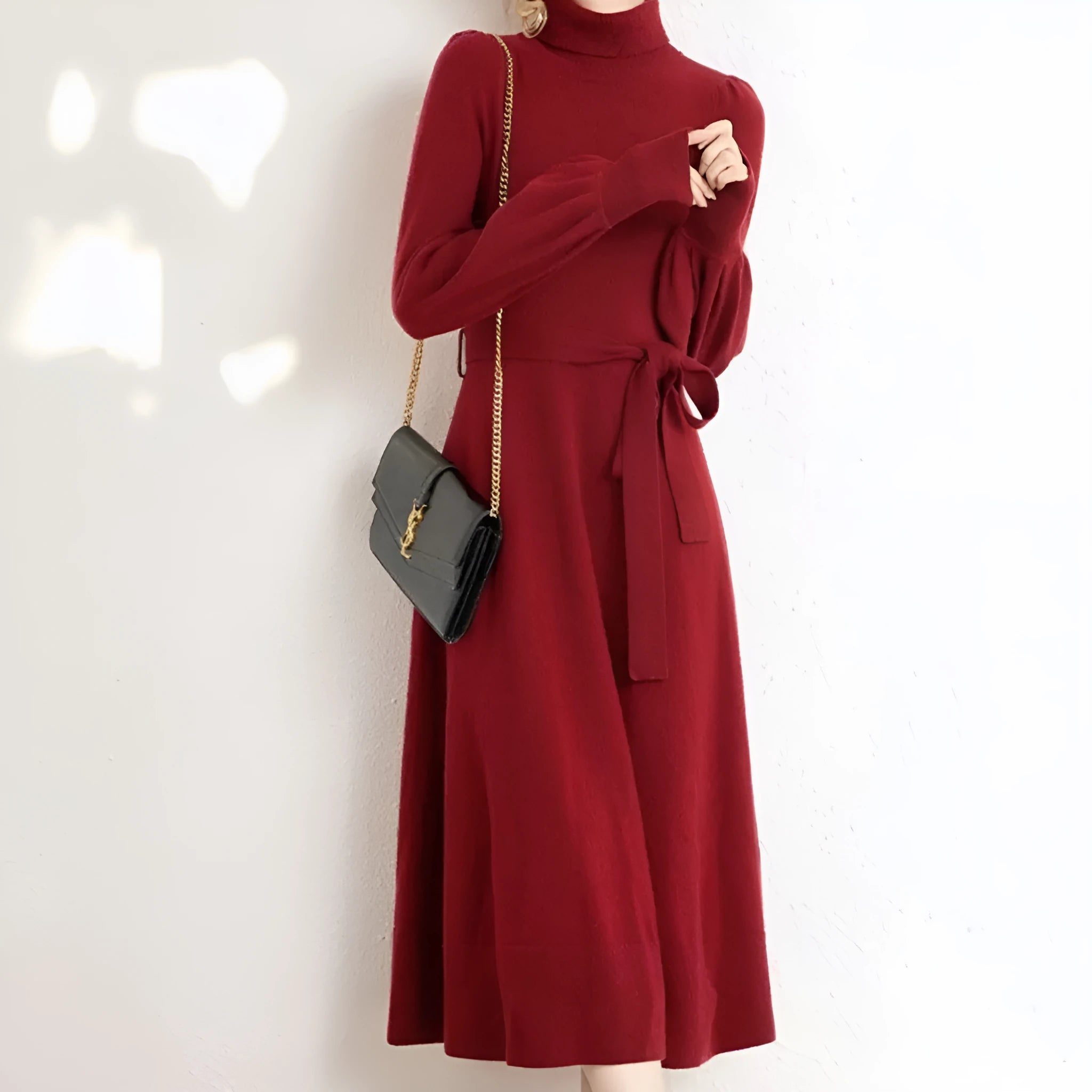 Women's turtleneck knit dress in rose red with long sleeves, loose hem, and elastic waist.
