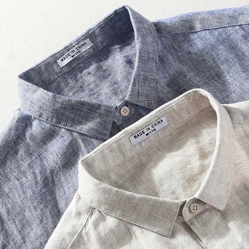 Men's short sleeve linen shirt with square collar in raw jute colour, laid flat.