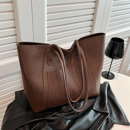 Retro shoulder bag in brown with double straps and mobile phone pocket
