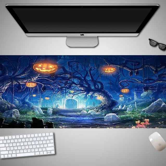 Oversized Halloween themed gaming mouse pad with non-slip rubber cloth base on a desk
