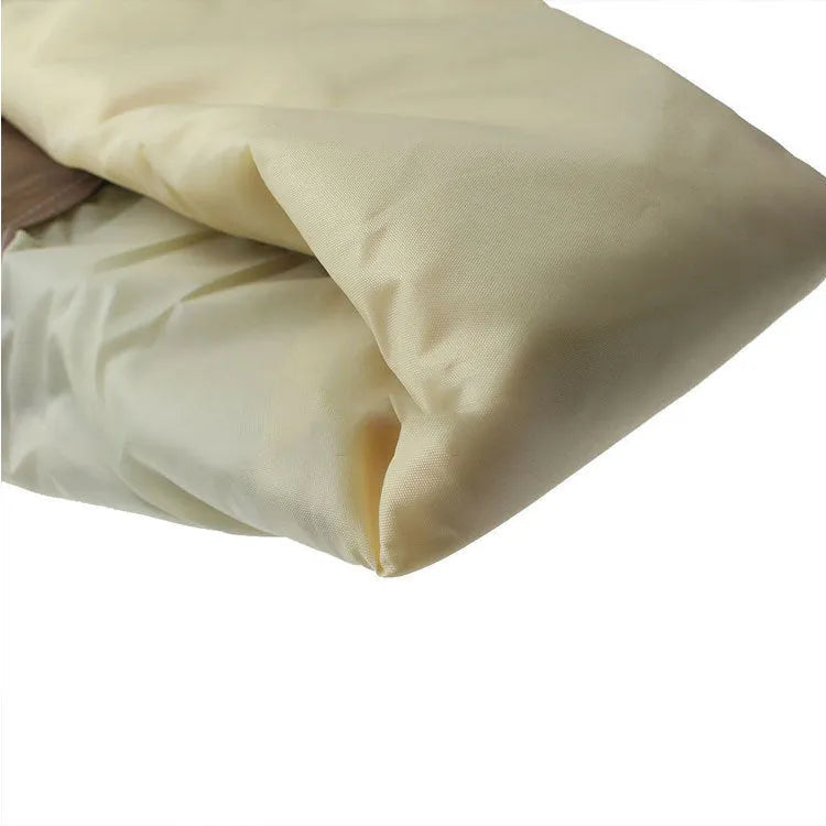 Beige polyester barbecue hood cover shown draped, illustrating its Nordic style and size for outdoor oven protection.