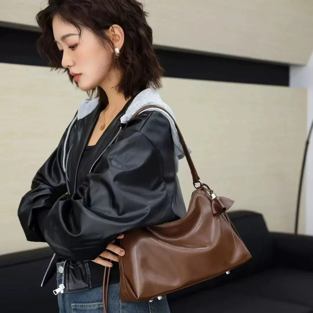 Cortex Lady genuine leather crossbody bag in caramel colour, horizontal square shape with stitching detail