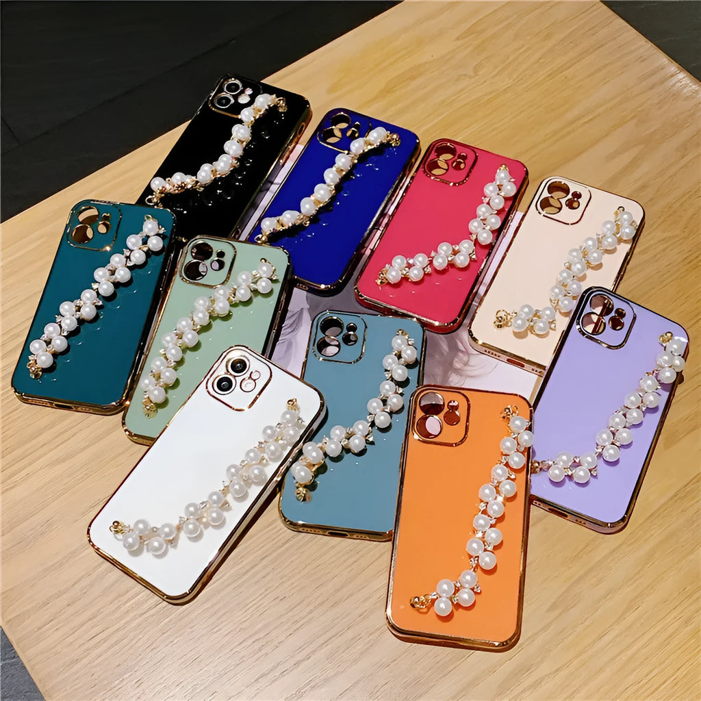 Soft TPU electroplated pearl wrist phone case for Apple iPhone in pink, showing back cover design.