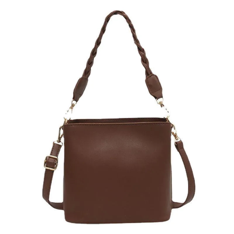 Retro woven PU one-shoulder crossbody underarm bucket bag in khaki colour.