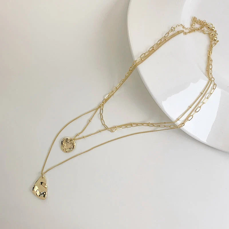 Multi-layer unisex clavicle chain with geometric triangle pendant and snake bones chain