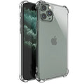 Clear transparent shockproof TPU phone case for Apple iPhone models on a table.