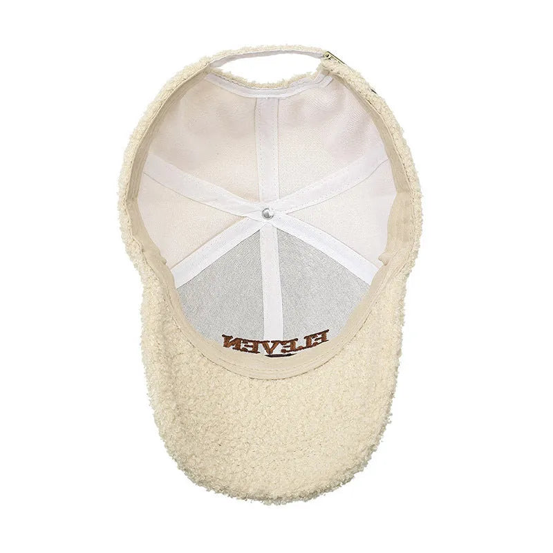 Adjustable lambskin-look winter baseball cap in dome crown style shown in multiple colours.